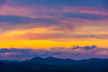 Fototapeta na wymiar Beautiful sunrise over the mountain range at the west of thailand, nature landscape twilight background .