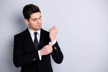 Portrait charming handsome economist agent stylish touch hand fingers button feel relaxed calm minded have project strategy young boss chief wear fashionable clothing isolated silver background