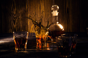 cocnac splash of alcohol in a glass
