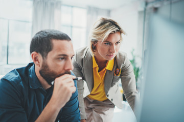Fototapeta premium Coworkers team at modern office.Young business crew working with new startup idea studio.Blurred background