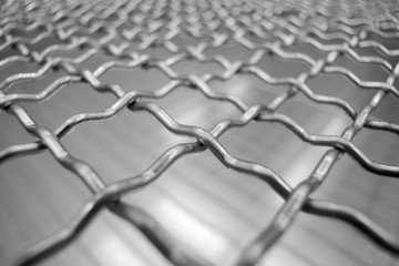 Stainless steel mesh background, square wireframe stainless material.
