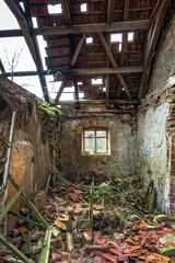 Fototapeta na wymiar view inside of an abandoned farm house