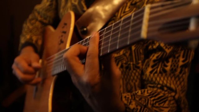 acoustic guitar player