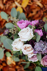 Beautiful wedding colorful bouquet for bride. Beauty of colored flowers. Close-up bunch of florets. Bridal accessories. Female decoration for girl. Details for marriage and for married couple