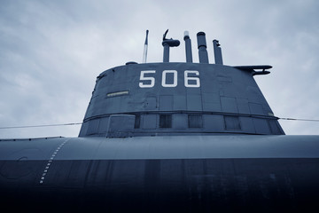 military u boat cruisers in the row - Part of submarine from World War 2.