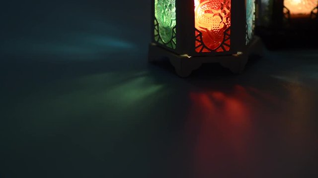 Side view low light static footage of Moroccan lantern.