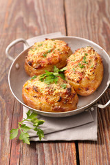 baked potato with cheese and crust