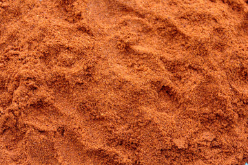 Cayenne pepper powder texture background pattern
