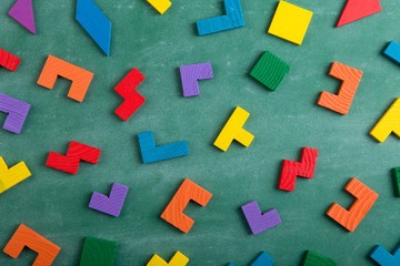 Creative solution for idea - business concept, jigsaw puzzle on the blackboard