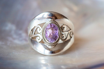 Beautiful silver ring with cut amethyst gemstone