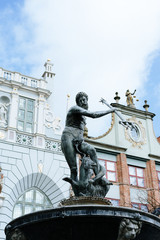 Fototapeta na wymiar Neptune Fountain in Polish Gdansk