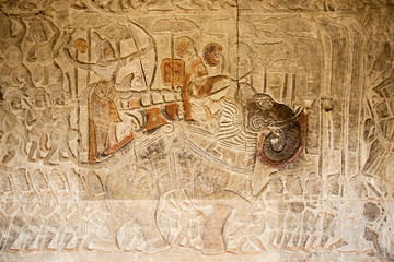 Ancient War with elephant parade on Relief in Angkor Wat Temple Wall, Cambodia