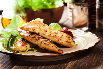 Grilled chicken breasts served with grilled paprika