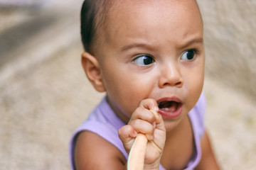 Baby boy learning to brush teeth