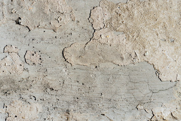 abstract concrete background closeup, grey light cracked