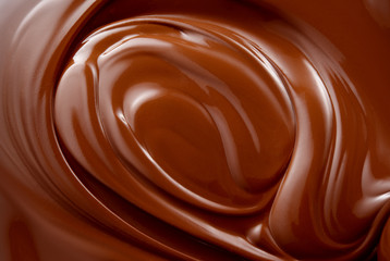Chocolate background. Melted chocolate.