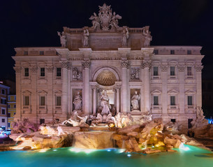 Night view of Rome Trevi Fountain (Fontana di Trevi) in Rome, Italy. Trevi is most famous fountain of Rome. Architecture and landmark of Rome,