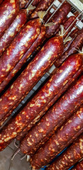 Pork and beef meat salami just from smoker ready for ripening process.