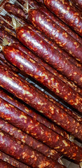 Pork and beef meat salami just from smoker ready for ripening process.