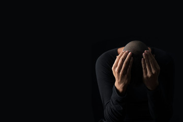 desperate man with his hands in his head