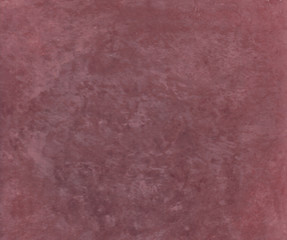 Tadelakt sample, lime coating écologic and natural. Violet prum color texture background.