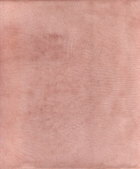 Tadelakt sample, lime coating ecologic and natural. Pink texture background.