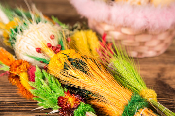 Easter. Colorful palms and base. Foods for Easter candles. Eggs and basket. Easter cake