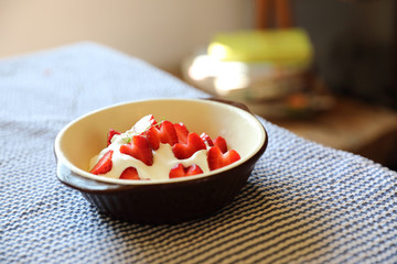 Strawberry with cream on table dessert