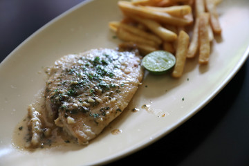 Halibut fillet steak with chips