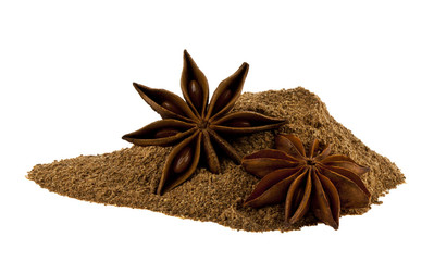 Pile of cinnamon and anise stars isolated on white background.