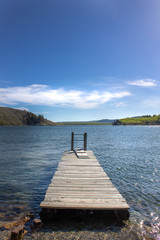 Fototapeta na wymiar wooden jetty on the lake