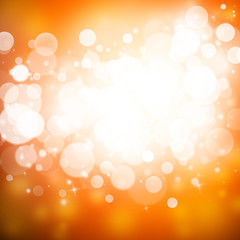 Gold sparkle rays lights with bokeh elegant abstract background. Dust sparks background.