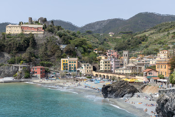 MONTEROSSO, LIGURIA/ITALY  - APRIL 22 : View of the coastline at Monterosso Liguria Italy on April 22, 2019. Unidentified people