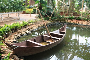 Old wooden boat on lake bank