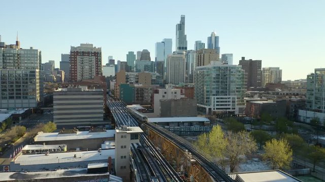 Slow Pan Left as CTA Train Enters Chicago Loop [4K] [Aerial]