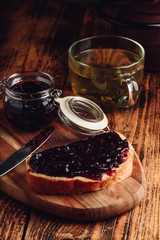 Toast with berry jam and green tea