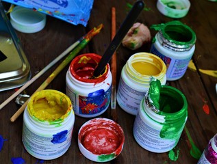 watercolor paints and brushes