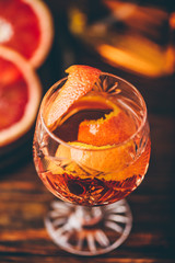 Glass of orange whiskey sour cocktail