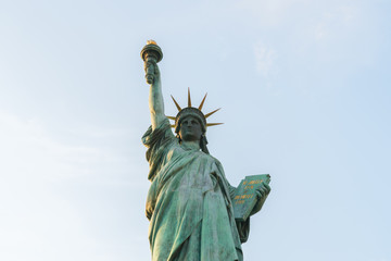 Fototapeta premium Statue of liberty on blue sky background.