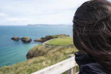 Fototapeta premium A woman enjoying a view at the sea