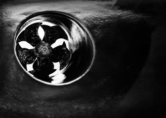 round ventilator turns in the hull of the ship