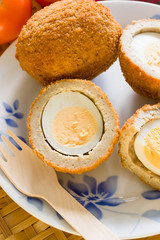 Scotch eggs a hard boiled egg wrapped in pork sausage meat and breadcrumbs a favourite picnic snack