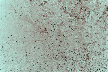 Vintage cyan background. Rough painted wall of hazel color. Imperfect plane of brown colored. Uneven old decorative toned backdrop of blue tint. Texture of azure hue. Ornamental stony surface.