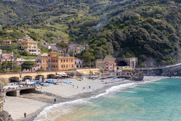 Fototapeta na wymiar MONTEROSSO, LIGURIA/ITALY - APRIL 22 : View of the coastline at Monterosso Liguria Italy on April 22, 2019. Unidentified people
