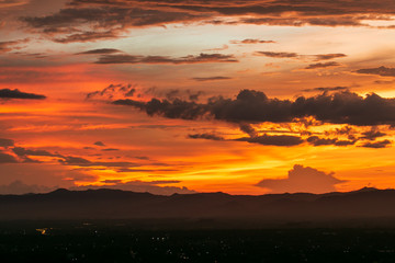 colorful dramatic sky with cloud at sunset.