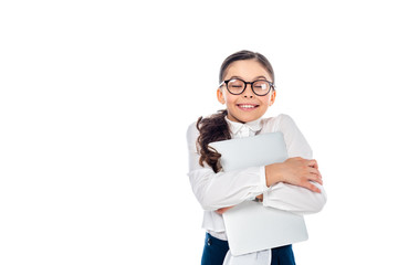 happy schoolchild in glasses holding laptop Isolated On White with copy space