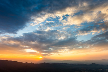 colorful dramatic sky with cloud at sunset