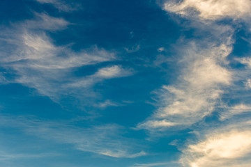 colorful dramatic sky with cloud at sunset.