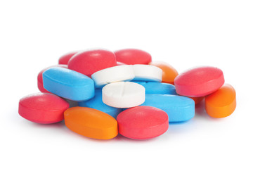 Obraz na płótnie Canvas colorful pills isolated on white