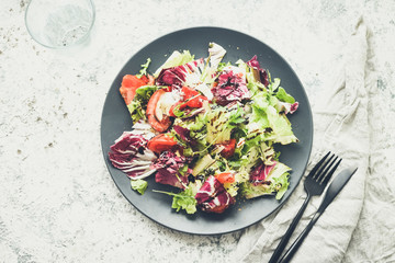 Vegetable salad mix on a wooden table